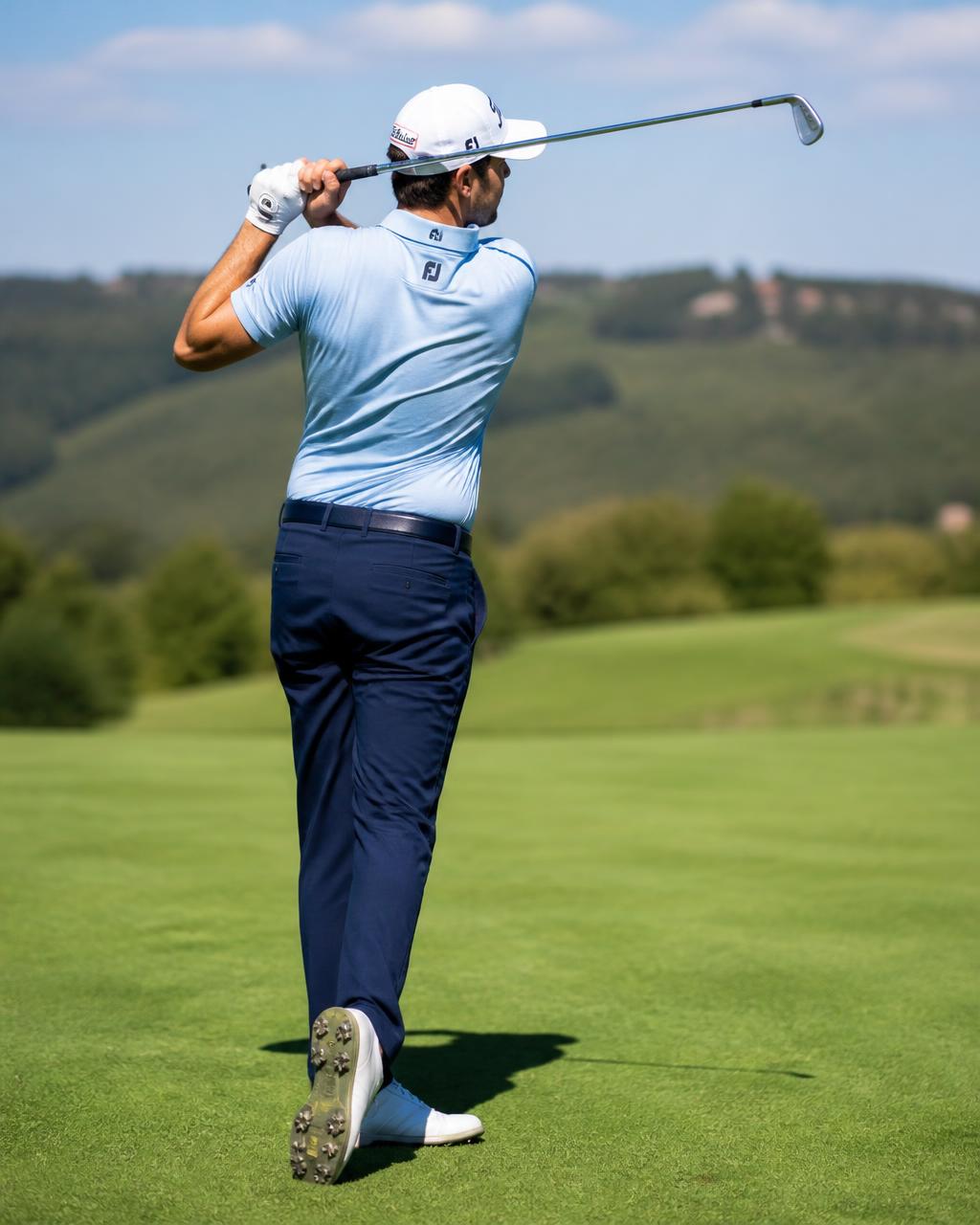 Member taking a swing at the annual charity golf outing